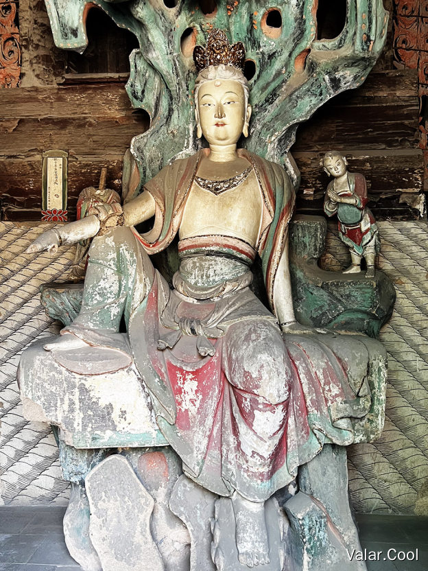 倒座自在观音像